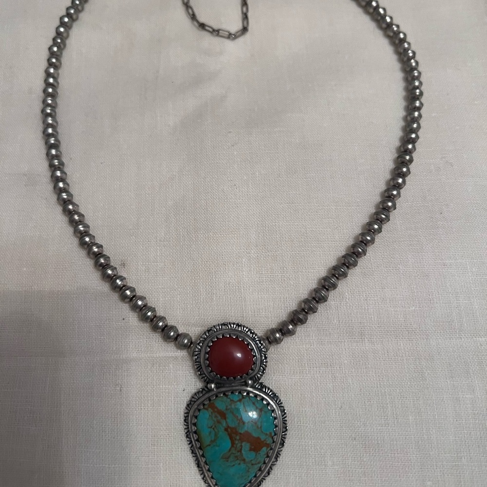 Sterling silver turquoise and red coral necklace.